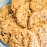 Homemade old-fashioned oatmeal raisin cookies on a plate.