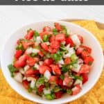 Homemade TGI Friday's pico de gallo and tortilla chips on a plate.