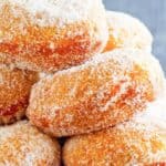 Homemade Chinese buffet sugar donuts piled on a plate.