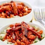 Two bowls of homemade Chipotle smoked brisket over cilantro lime rice.