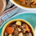 Crockpot carne guisada in two bowls.