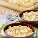 Everyday chicken casserole in two bowls and a glass baking dish.