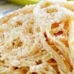 A bowl of homemade Olive Garden alfredo sauce on fettuccine.