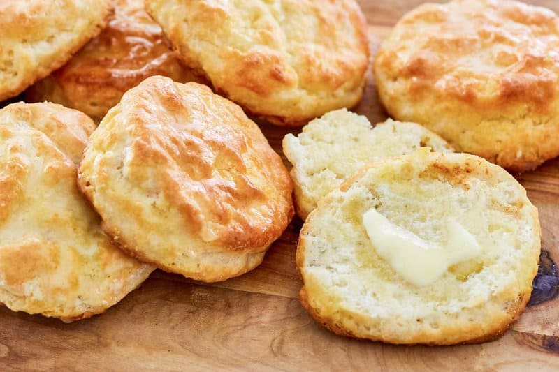 Copycat Popeyes buttermilk biscuits on a serving board.