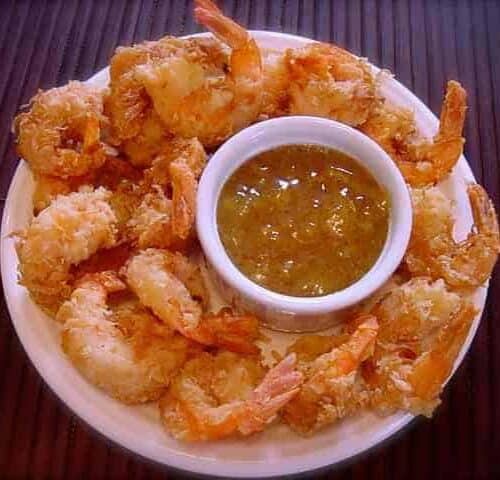 Copycat Joe's Crab Shack dipping sauce and fried shrimp around it.