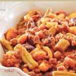 Crockpot calico beans in a serving dish.