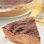 Slice of homemade chocolate peanut butter pie on a small plate.