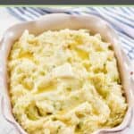 Homemade Irish colcannon potatoes in a scalloped edge serving dish.