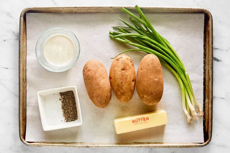 Irish champ potatoes ingredients on a tray.