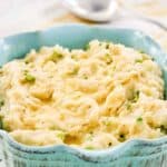 Homemade Irish champ mashed potatoes in a serving dish.