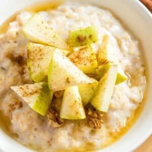 A bowl of slow cooker apple cinnamon oatmeal.