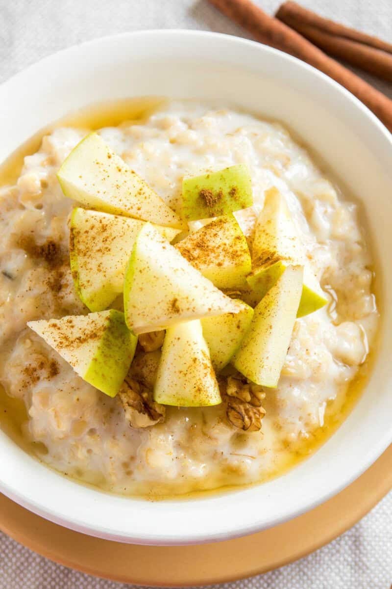 A bowl of slow cooker apple cinnamon oatmeal.