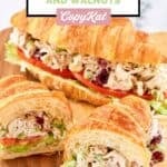 Homemade chicken salad with cranberries and walnuts in croissant sandwiches.