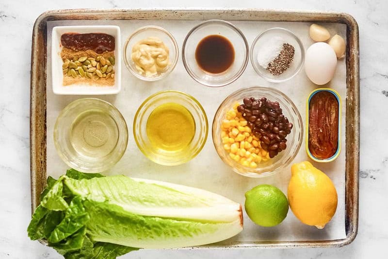 Copycat Houston's southwest caesar salad ingredients on a tray.