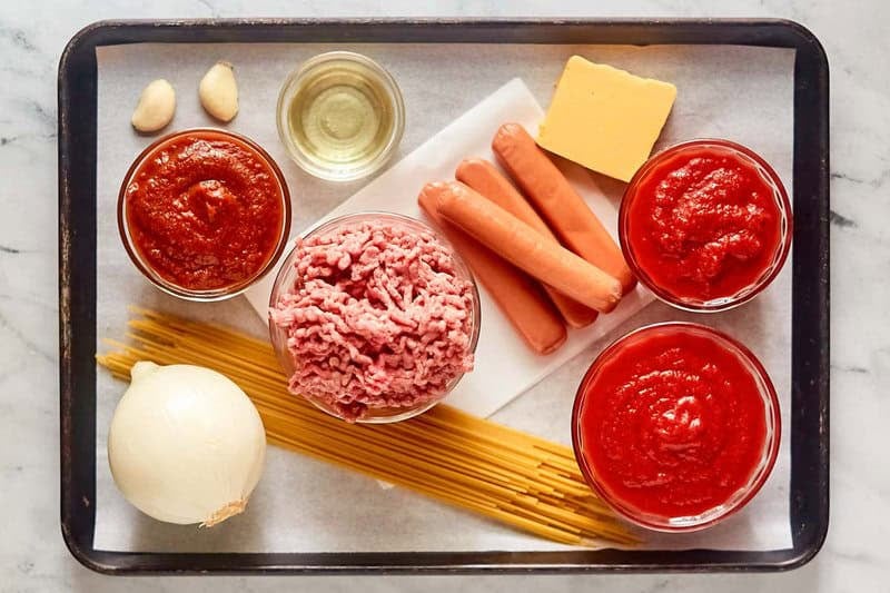 Copycat Jollibee spaghetti ingredients on a tray.