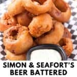 Copycat Simon and Seafort's beer battered onion rings in a basket.