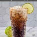 Homemade Sonic Dirty Dr. Pepper drink garnished with lime in a tall glass.