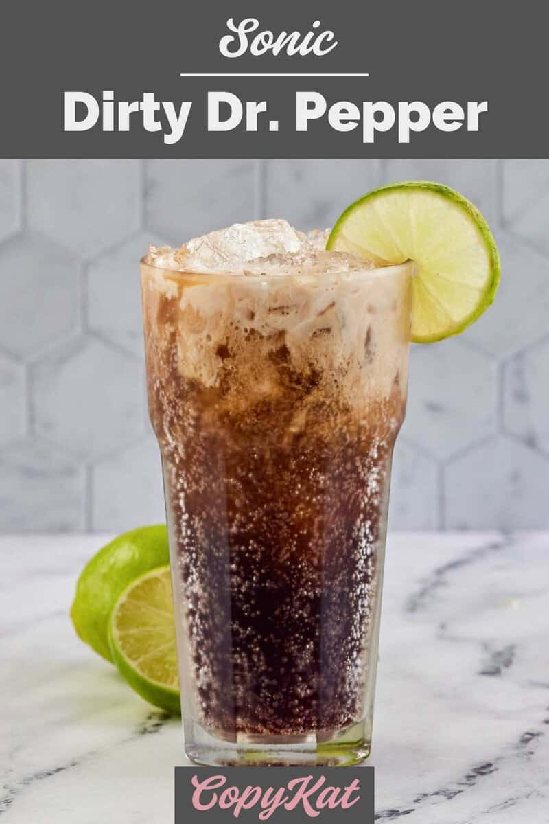 Homemade Sonic Dirty Dr. Pepper drink garnished with lime in a tall glass.