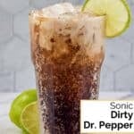 Homemade Sonic Dirty Dr. Pepper drink garnished with lime.