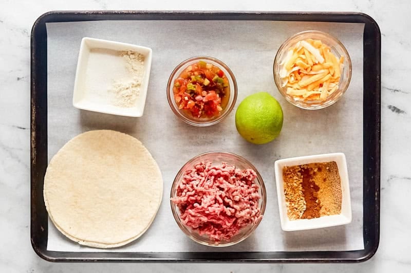 Copycat Taco Bell meximelt ingredients on a tray.