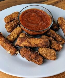 Copycat Burger King mozzarella sticks on a plate.