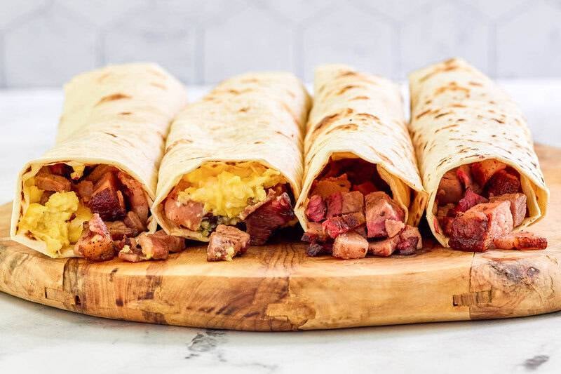 Four copycat Buc-ee's brisket breakfast tacos.