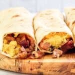 Two copycat Buc-ee's egg and smoked brisket breakfast tacos.