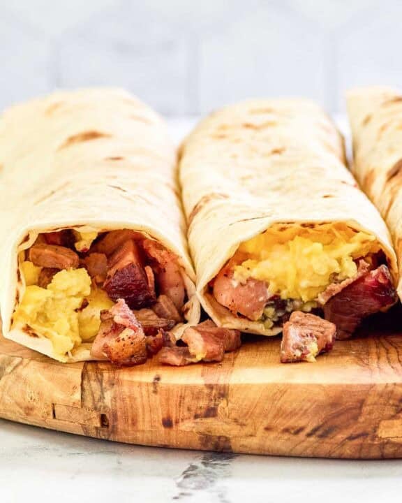 Two copycat Buc-ee's egg and smoked brisket breakfast tacos.