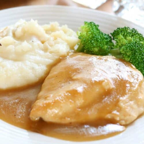 Roasted chicken breast with homemade chicken gravy.