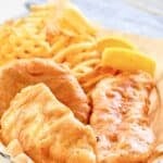 Fried fish with homemade Long John Silver's batter and fries in a basket.