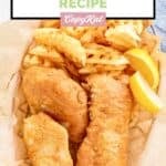 Fried fish with homemade Long John Silver's fish batter and waffle fries in a basket.