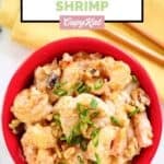Homemade Panda Express honey walnut shrimp and chopsticks behind it.
