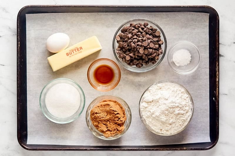 Copycat Subway chocolate chip footlong cookie ingredients on a tray.