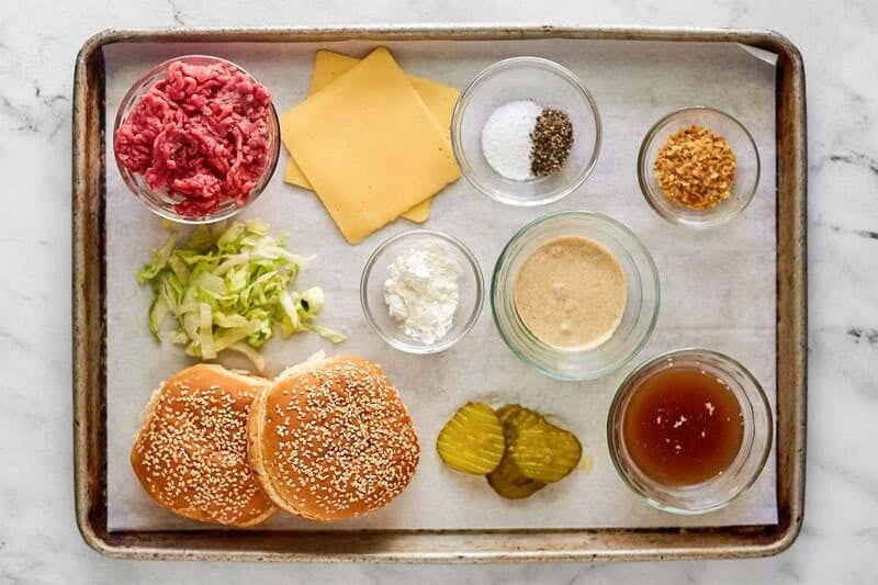 Big mac sloppy joes ingredients on a tray.
