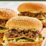 Three big mac sloppy joes on a platter.
