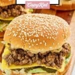 Big mac sloppy joe on a wood serving board.