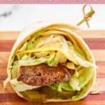 Homemade McDonald's big mac wrap with a decorative pick in it.