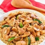 Copycat Panda Express mushroom chicken over rice in a bowl.
