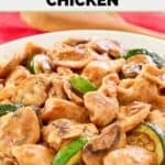 Homemade Panda Express mushroom chicken over rice in a large bowl.