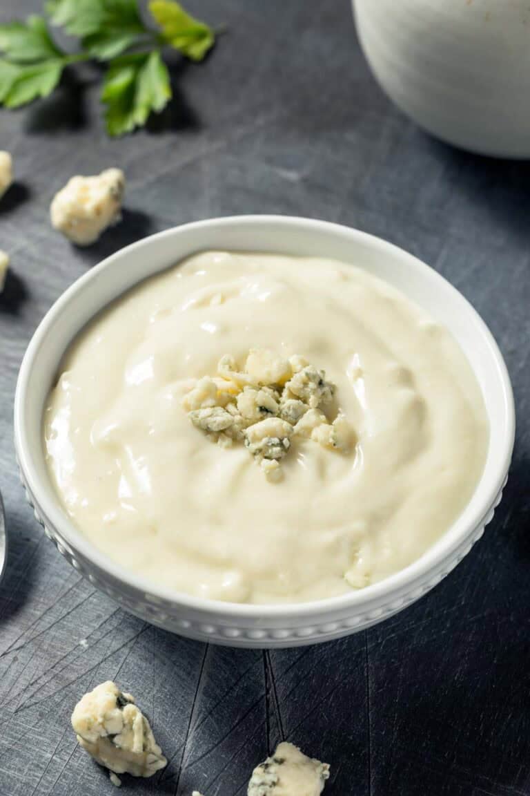 Copycat Simon and Seafort's blue cheese dressing and blue cheese crumbles.