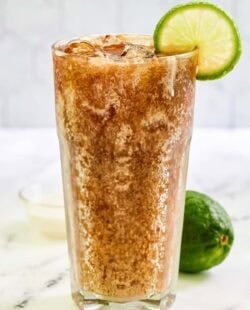 Copycat sonic dirty diet coke garnished with lime.