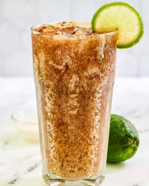 Copycat sonic dirty diet coke garnished with lime.