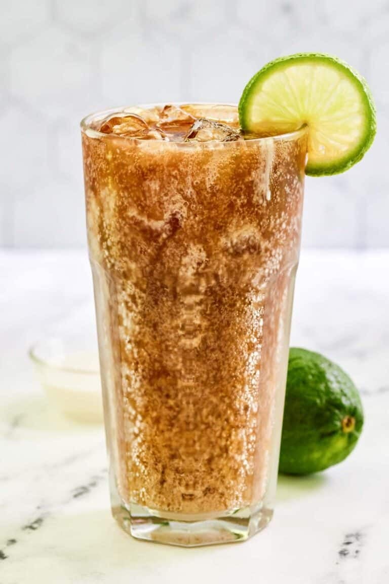 Copycat sonic dirty diet coke garnished with lime.