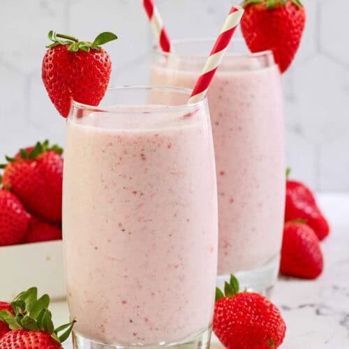 Copycat strawberry julius and fresh strawberries.