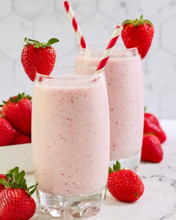 Copycat strawberry julius and fresh strawberries.