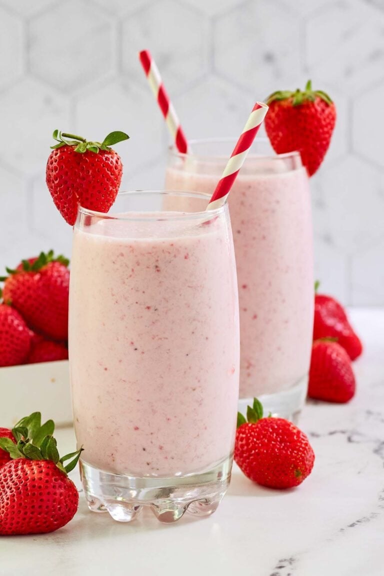 Copycat strawberry julius and fresh strawberries.