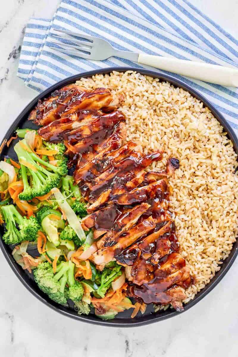 Copycat Teriyaki Madness chicken teriyaki with mixed vegetables and rice.
