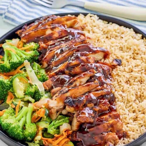 Copycat Teriyaki Madness chicken teriyaki with rice and mixed vegetables.