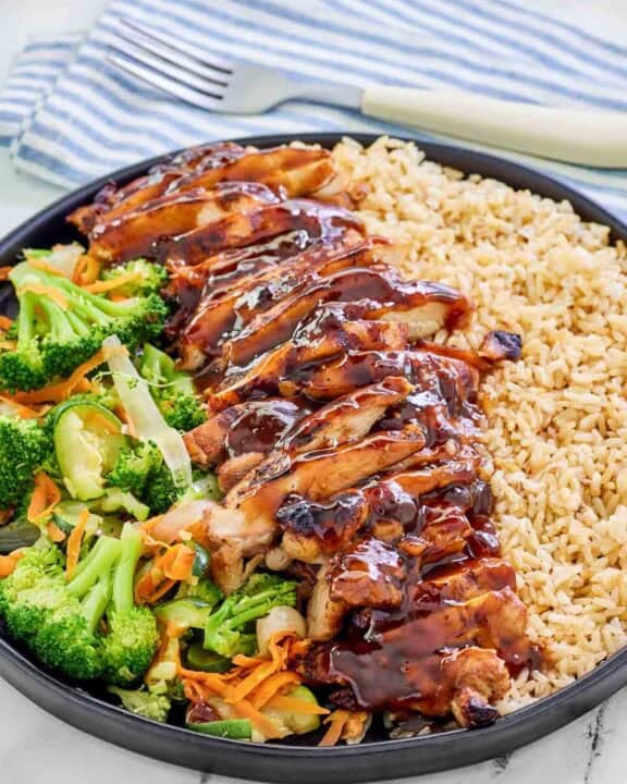 Copycat Teriyaki Madness chicken teriyaki with rice and mixed vegetables.