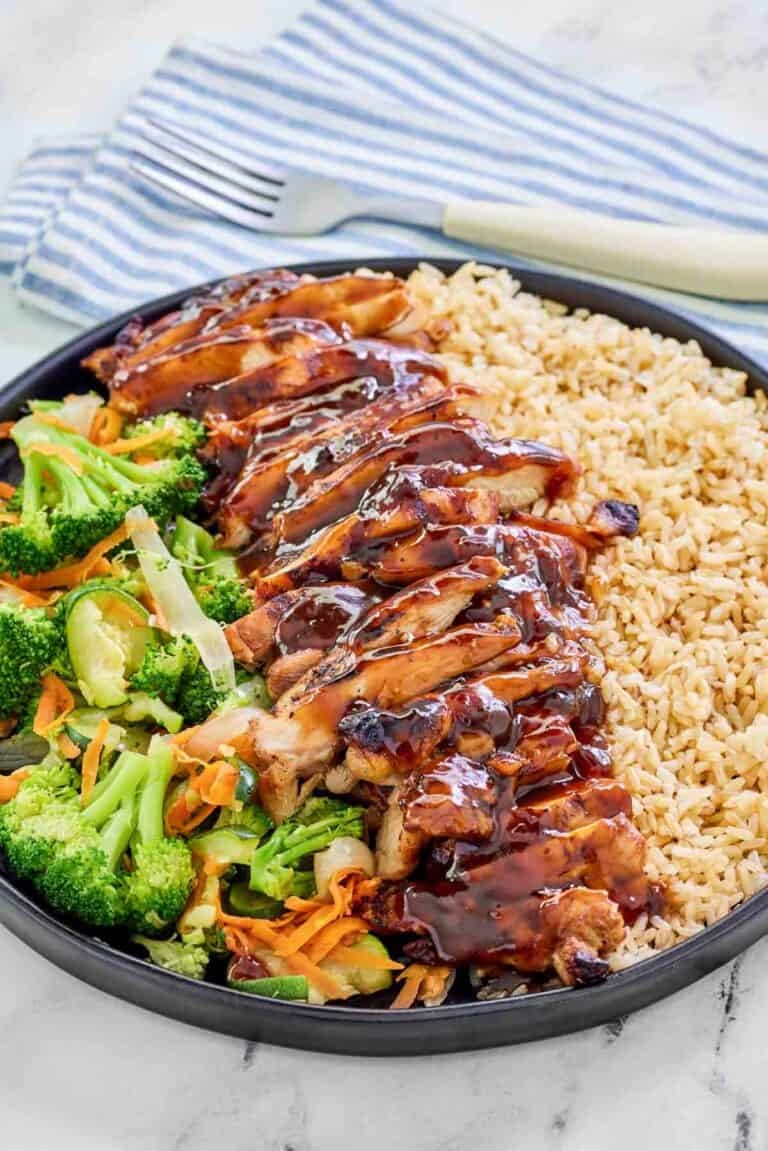 Copycat Teriyaki Madness chicken teriyaki with rice and mixed vegetables.